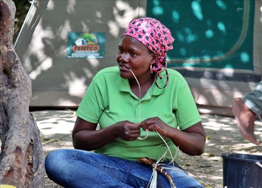 Weaving bracelets in the Okavango Delta campsite.