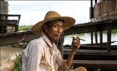 A fisherman enjoys a cigar in the fading light of Inle Lake (Myanmar): by zachashton, Views[354]