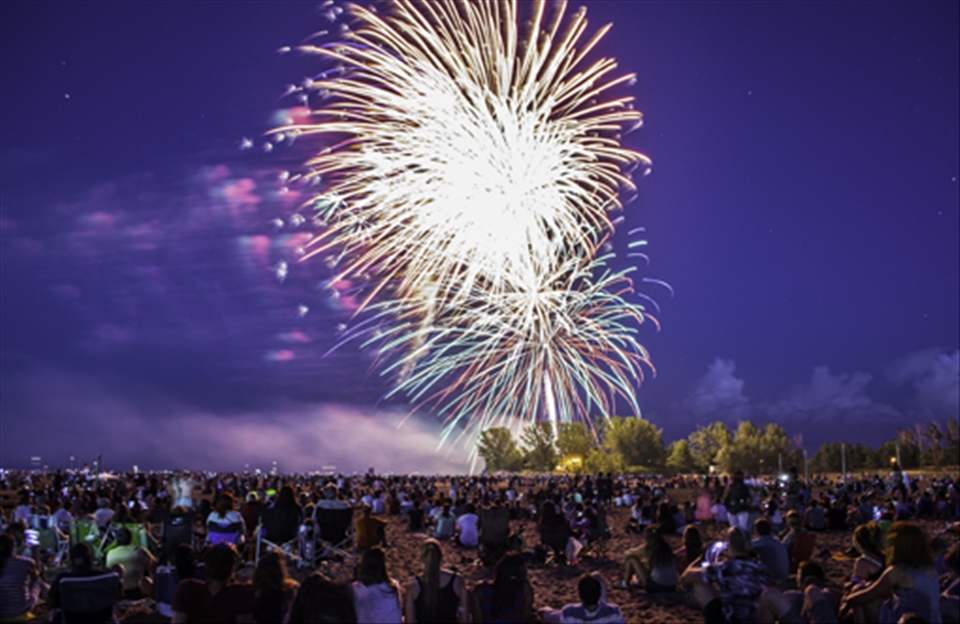 People gather to celebrate Canada Day on the beach!