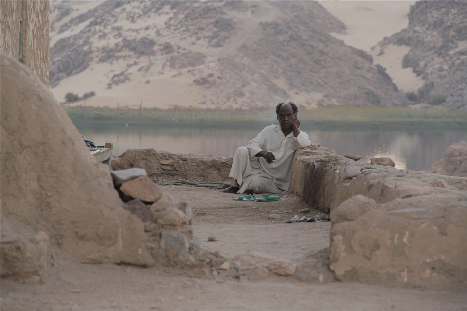 Joy of life: sitting alone amongst the moutains at sunset is his joy.