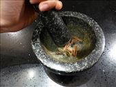 Crushing the spices with a mortar and pestle: by zarinakadirbaks, Views[291]