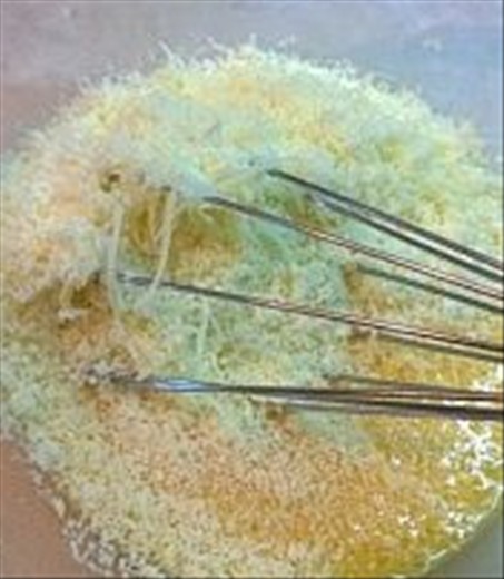 2)	Add grated Parmesan and salt