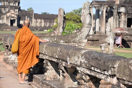 Buddhist monk is an inhabitant of the Angkor temple. He dreams one day to see the world enjoying peace.