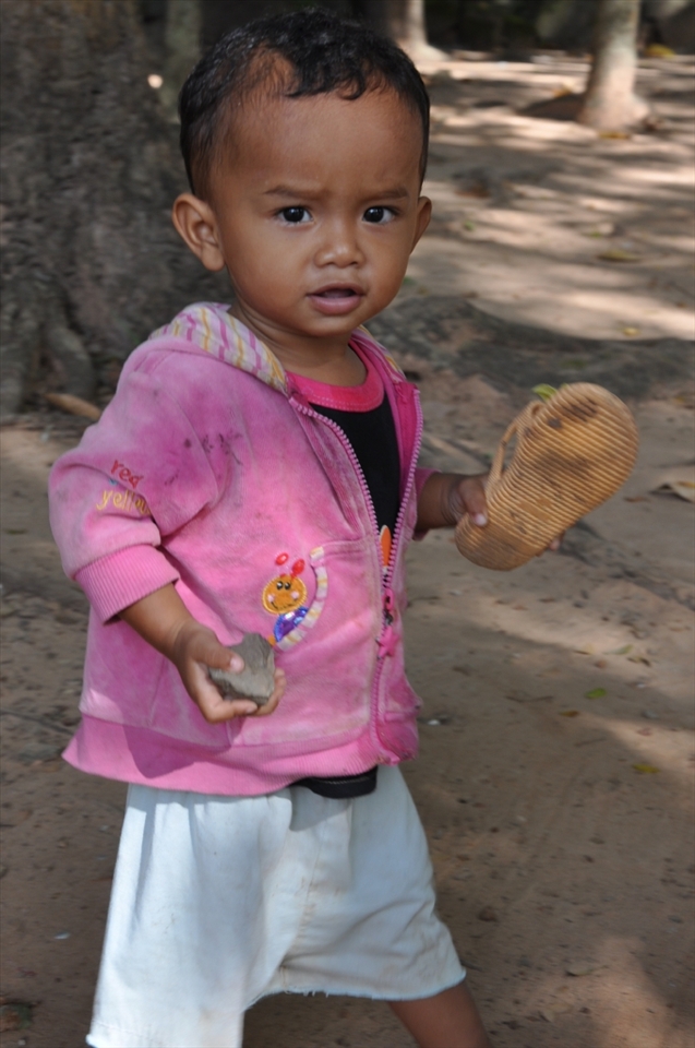 Hanging out Cambodian kid still reminds that any contribution we do is a Stepping Stones for better life.