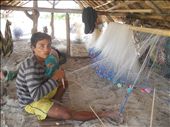 A fisherman were knitting his net under the smal tradisional fishing house: by ziadahjournal, Views[830]