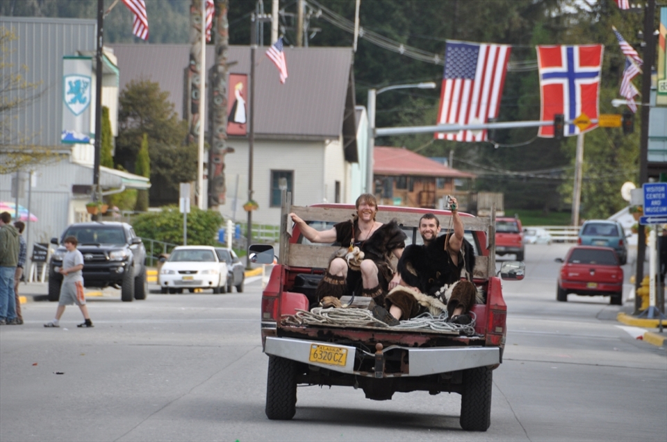 Two Vikings steal a ride at the end of the festival.  They will hang their hides until next year's grog flows again.