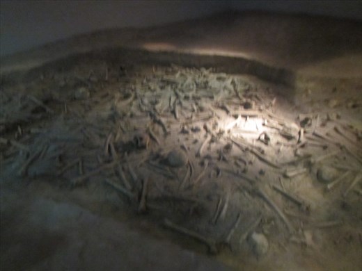 The mass grave with stacked skeletons - 10,000 estimated - sobering