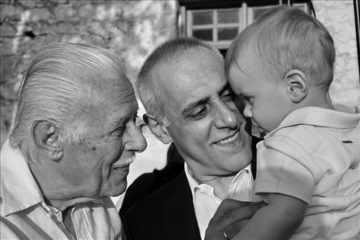 The last photo is from the Baptizing ceremony. It is a portrait that shows three