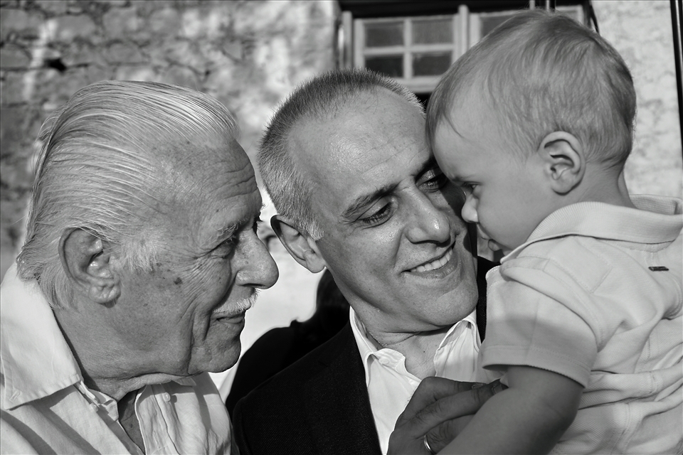 The last photo is from the Baptizing ceremony. It is a portrait that shows three