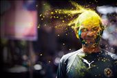 A grown man is subjected to a bucketful of coloured yellow powder in Sewri, Mumbai.: by zosogis, Views[649]