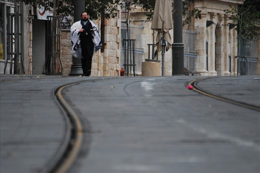 The Morning Commute:
Saturday morning in Jerusalem: the whole city is observing Sabbath. Public transportation does not run until sundown, cars stay off the road, people only walk to the synagogue. It may not be doing business, but the city is always open.