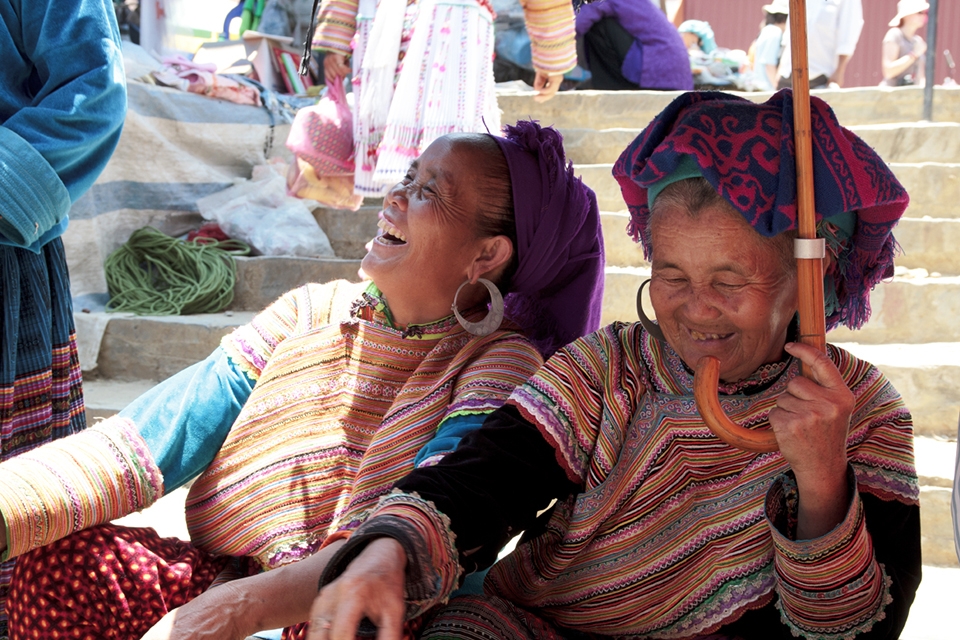 Since their Childhood, the Flower Hmong Ladies are walking long distances every Sunday to gather at the market for cultural and social exchange. The colorful traditional clothes tell about their origin of ethnicity, the smiles reveal about their kindness and joyful way of life.