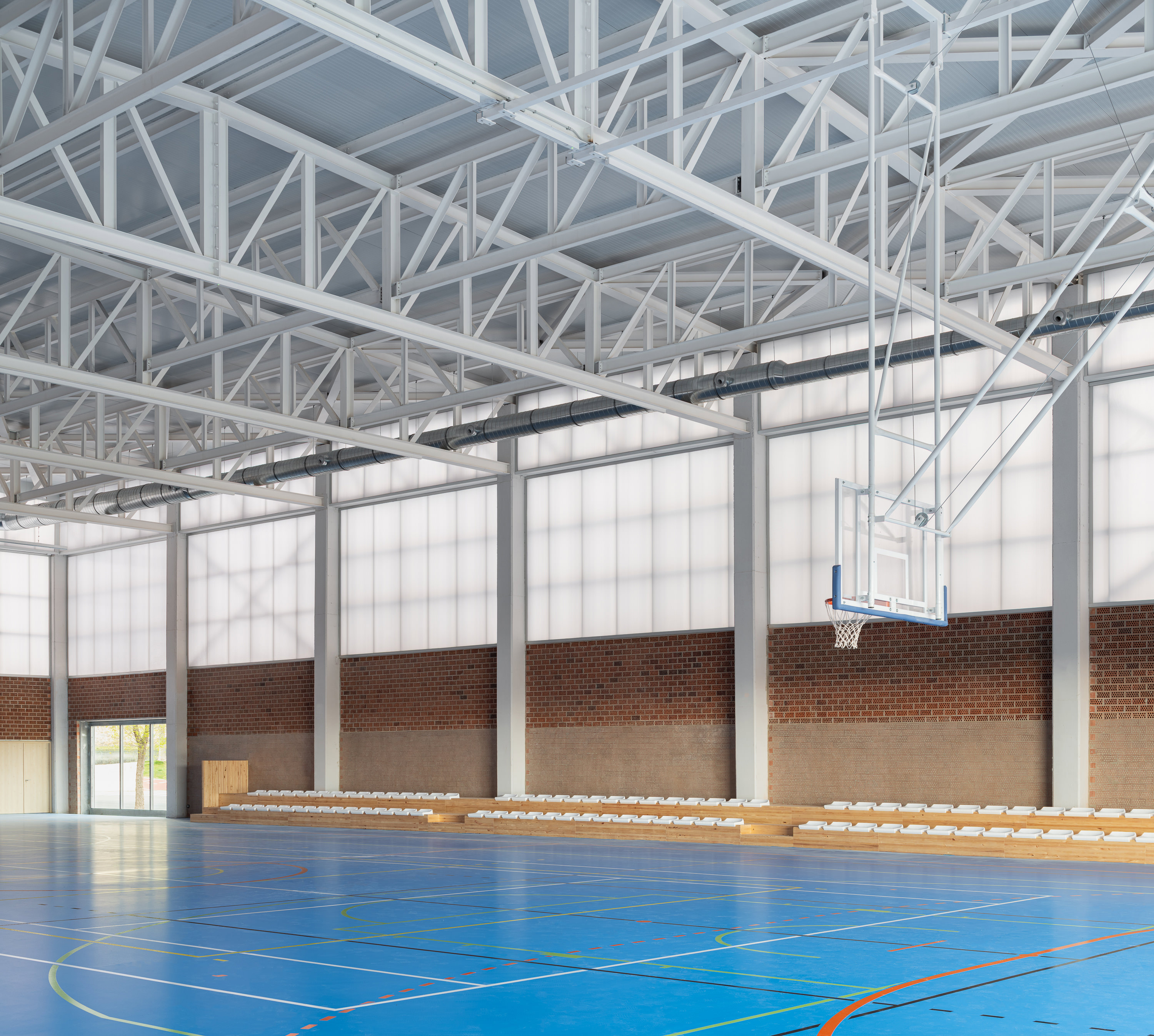 Dialogue in Brick – Pabellon Polideportivo Carlos Soria by ABLM Arquitectos
