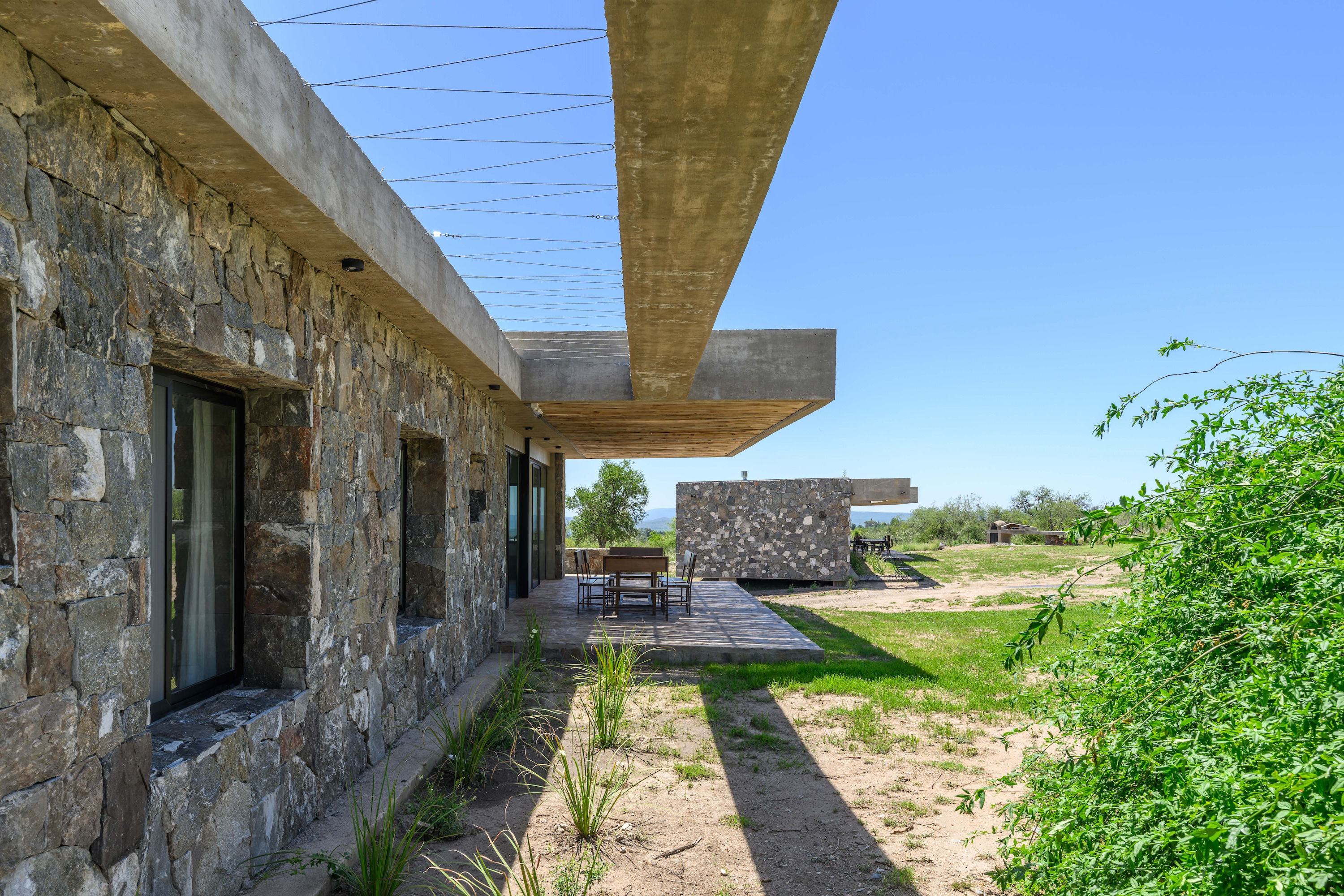 Gravity Held in Stone – Suspended Stone Houses by Paul Dragicevic