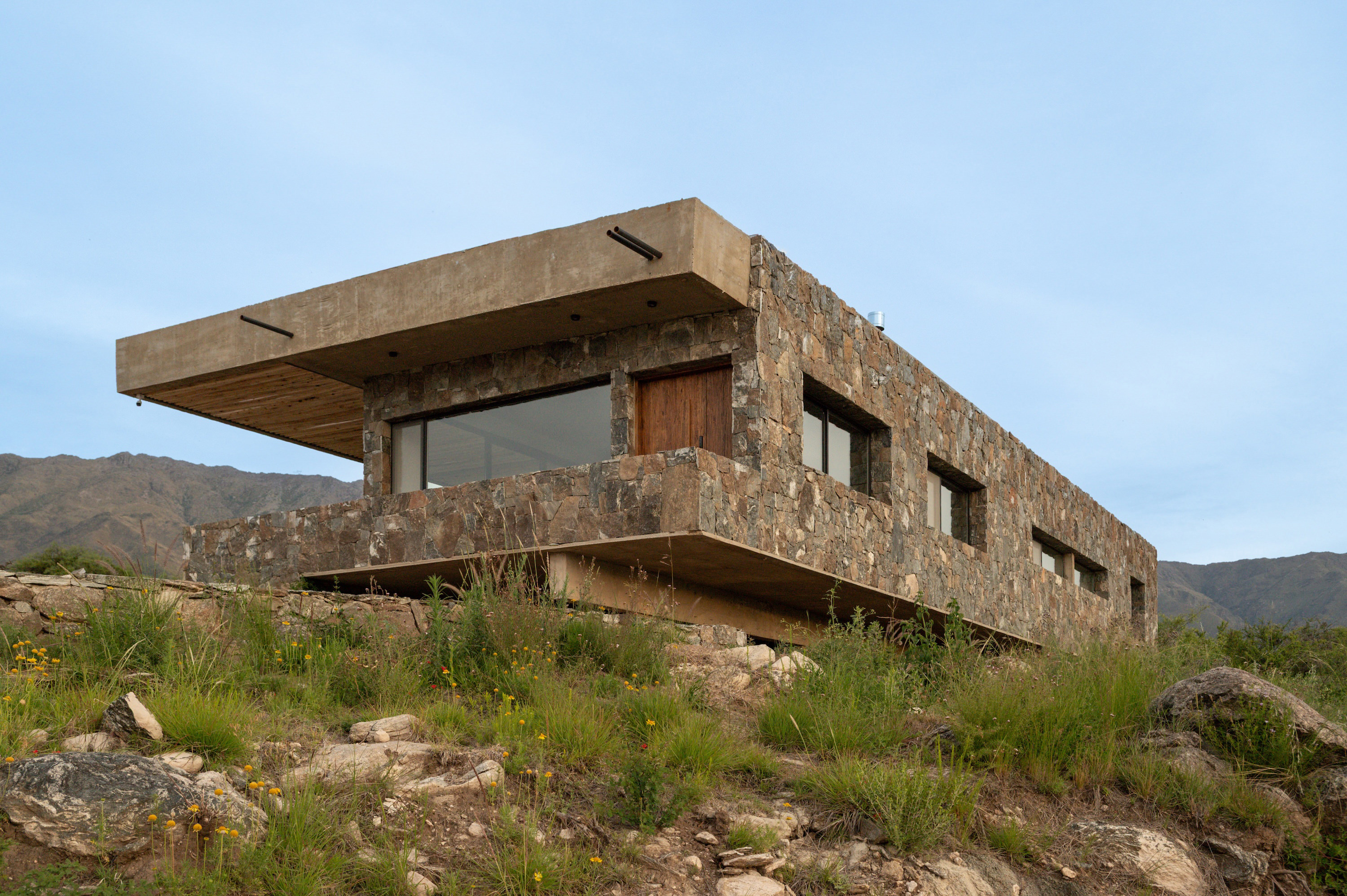 Gravity Held in Stone – Suspended Stone Houses by Paul Dragicevic