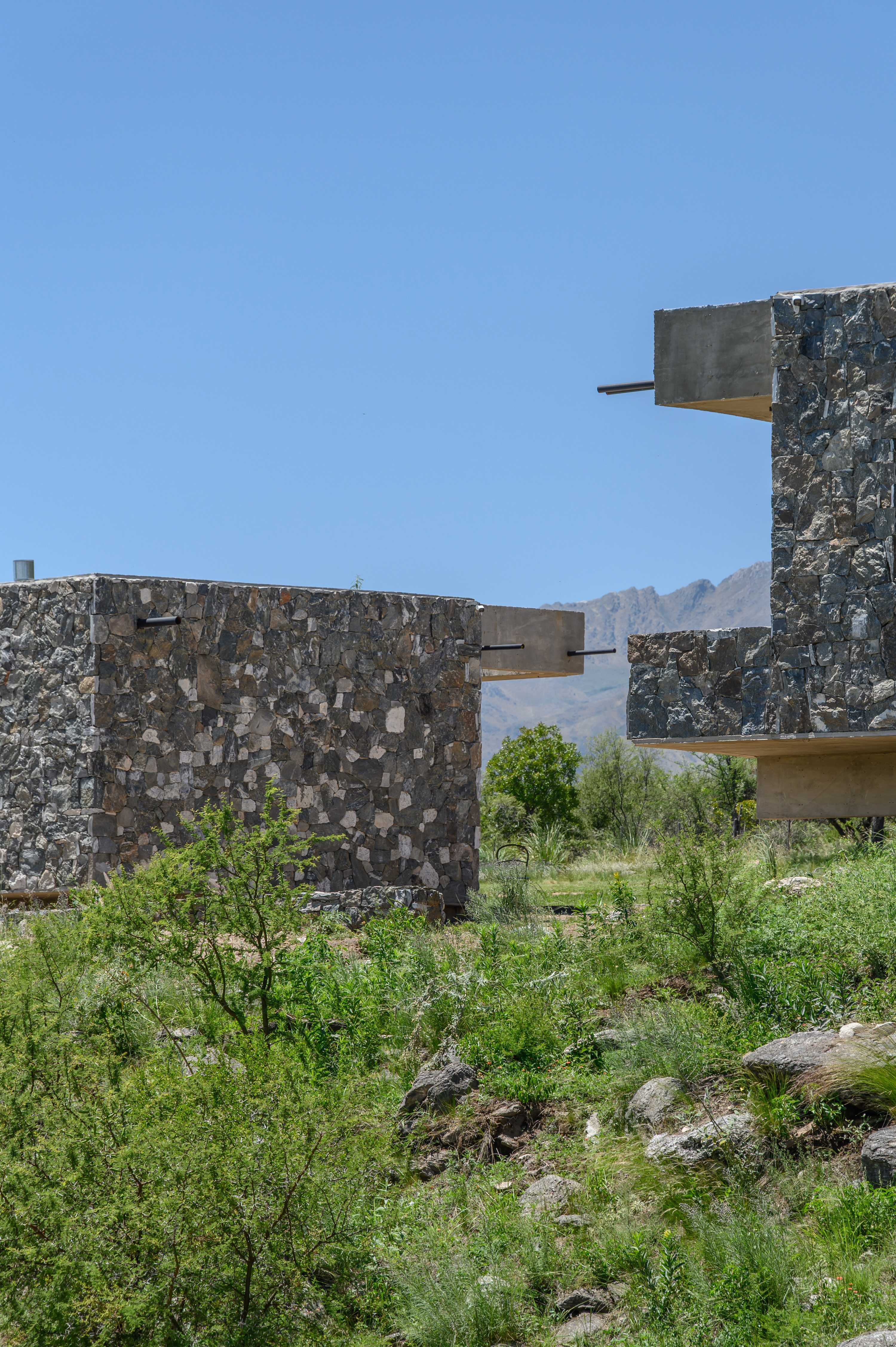 Gravity Held in Stone – Suspended Stone Houses by Paul Dragicevic