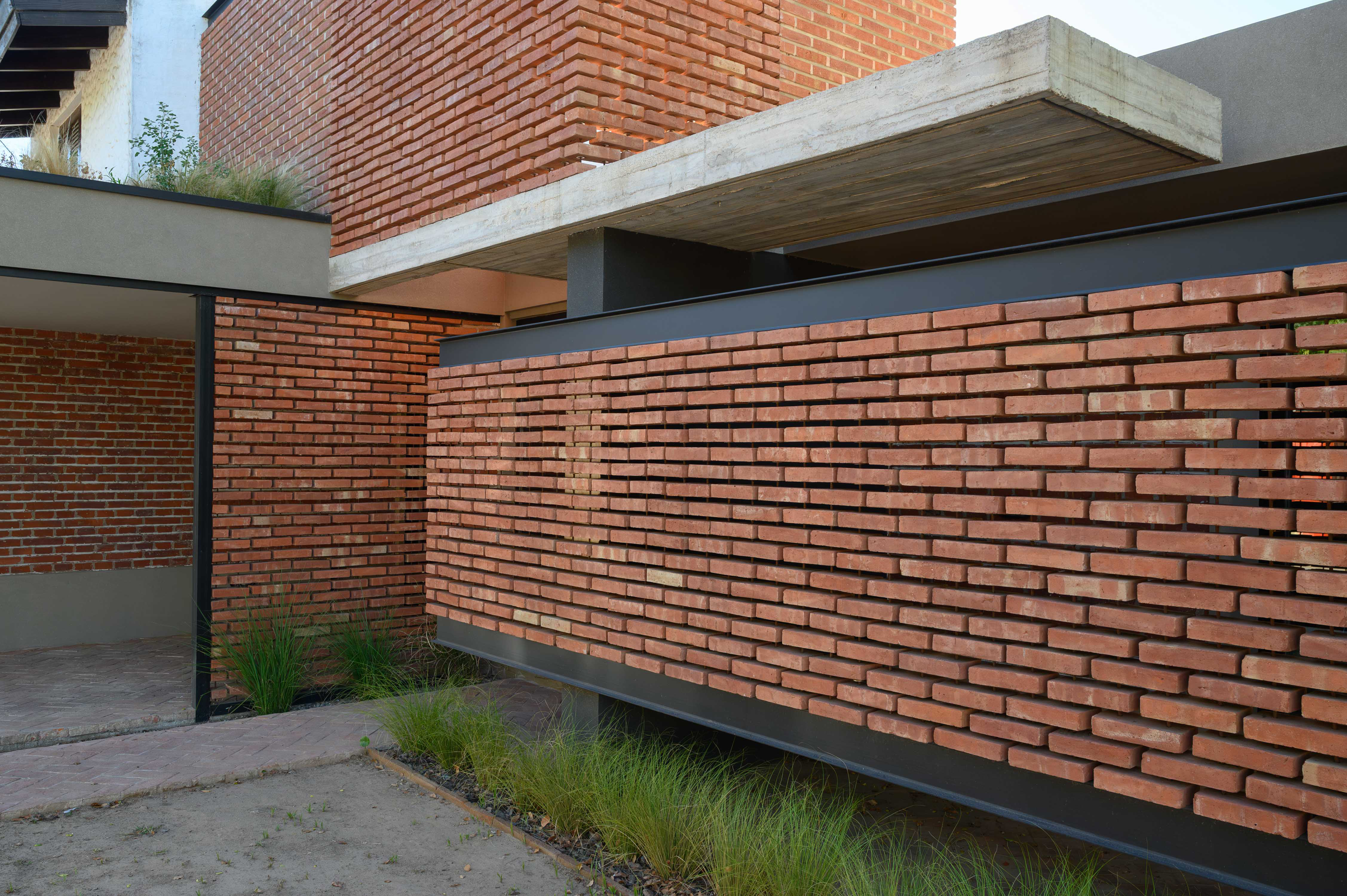 The Brick Redefines Space – House 1954 by EFEEME architects
