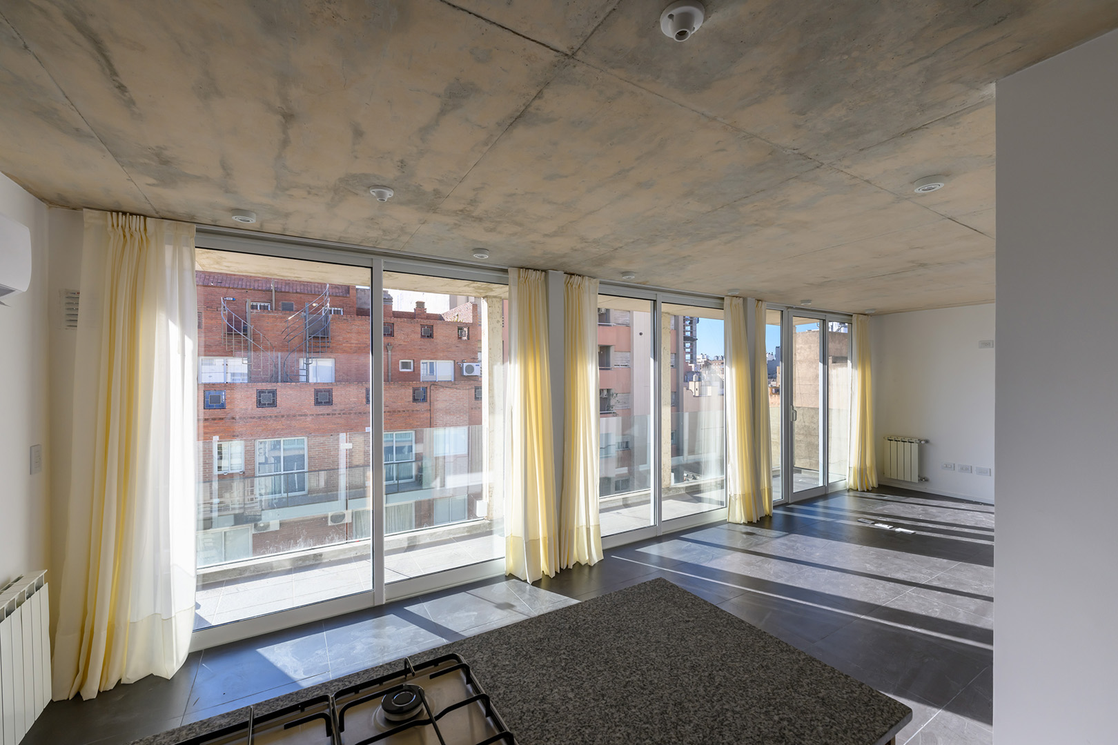 Design and Functionality – Justiniano Building by S_ Estudio