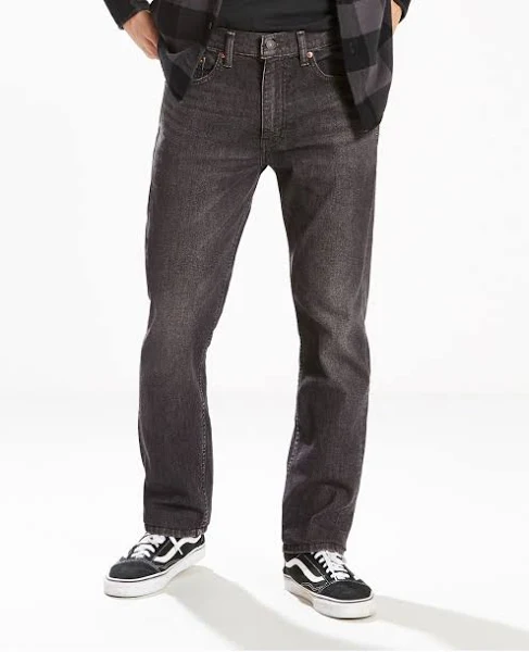 The original zip fly. First created in 1967, the 505 Regular Fit Jeans are one of Levi's most popular straight fits. Beloved for their classic straight leg style, they are cut to sit at the waist with extra room in the thigh and fall straight down to the ankle. The versatility of the straight leg is great for all body types. No need to choose between style or comfort, this jean has it all. For a modern look, try a thick cuff styled with casual sneakers.