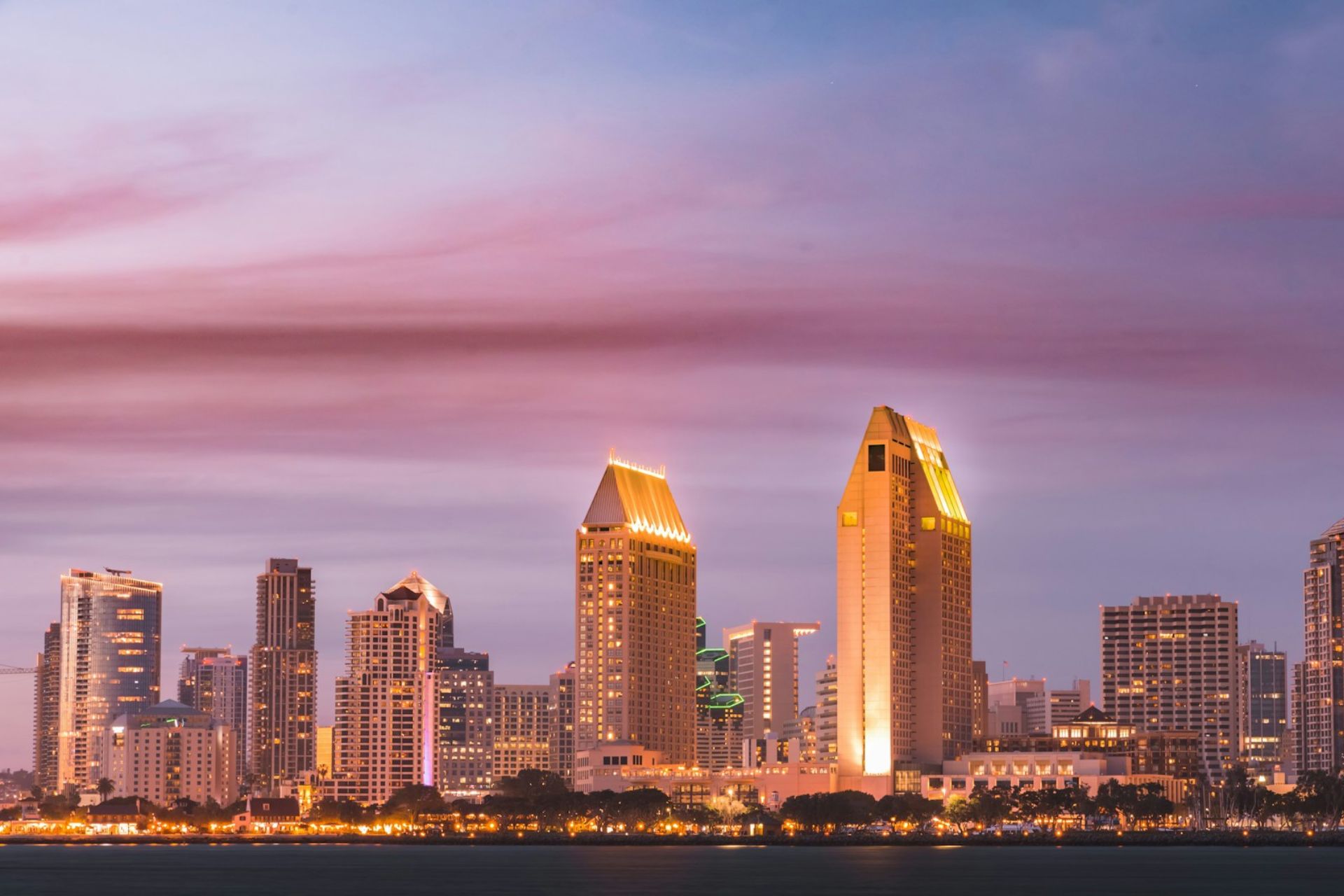 San Diego's cityscape lit up at sunset