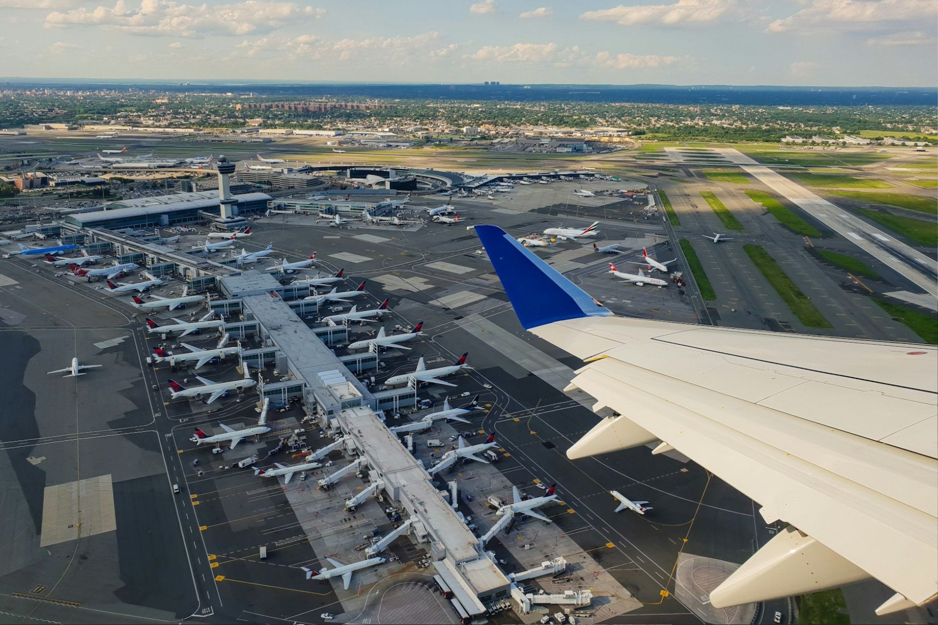 View over the wing of a plane taking off at JFK