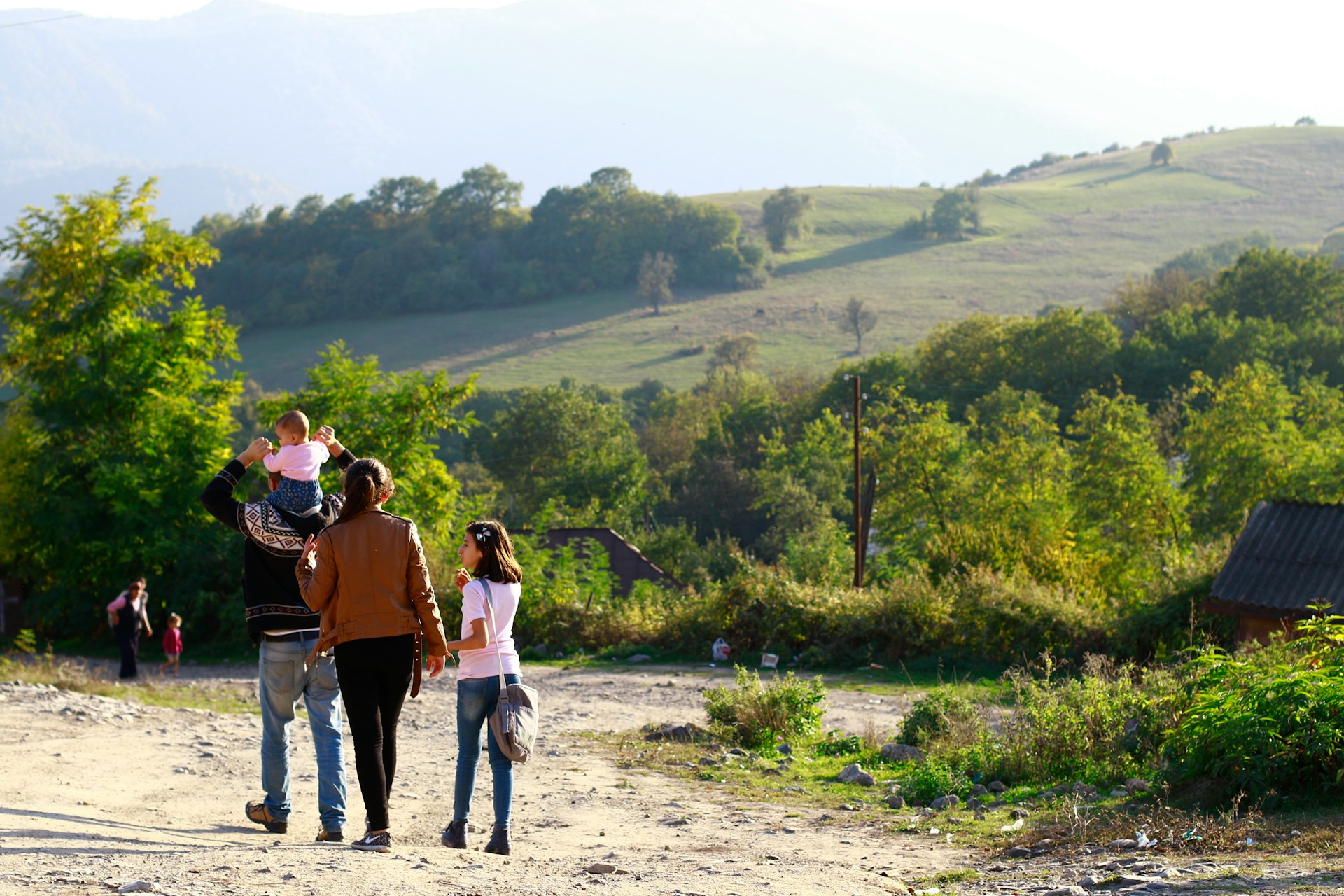 A family walking through the countryside