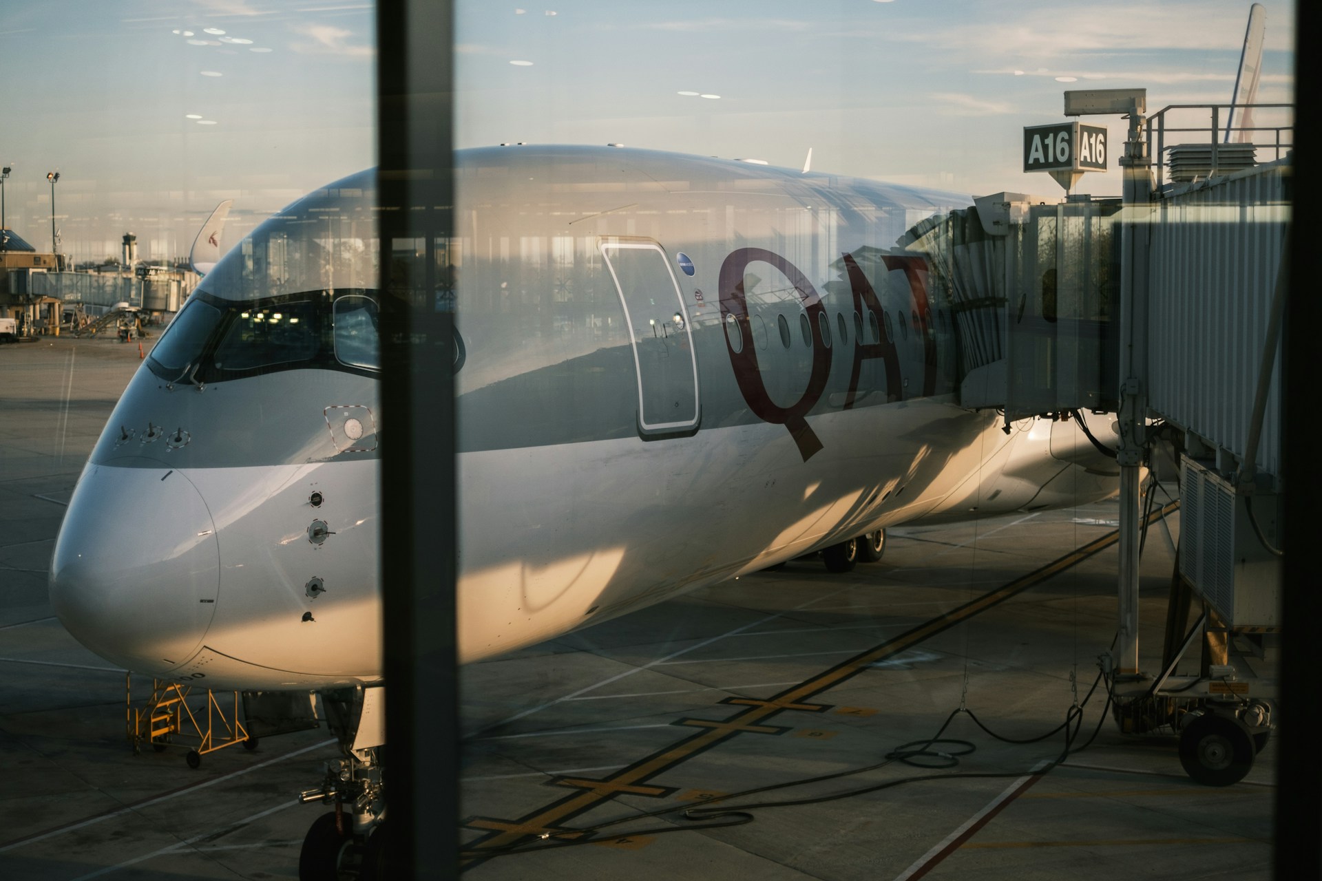 Airplane boarding passengers via terminal gate