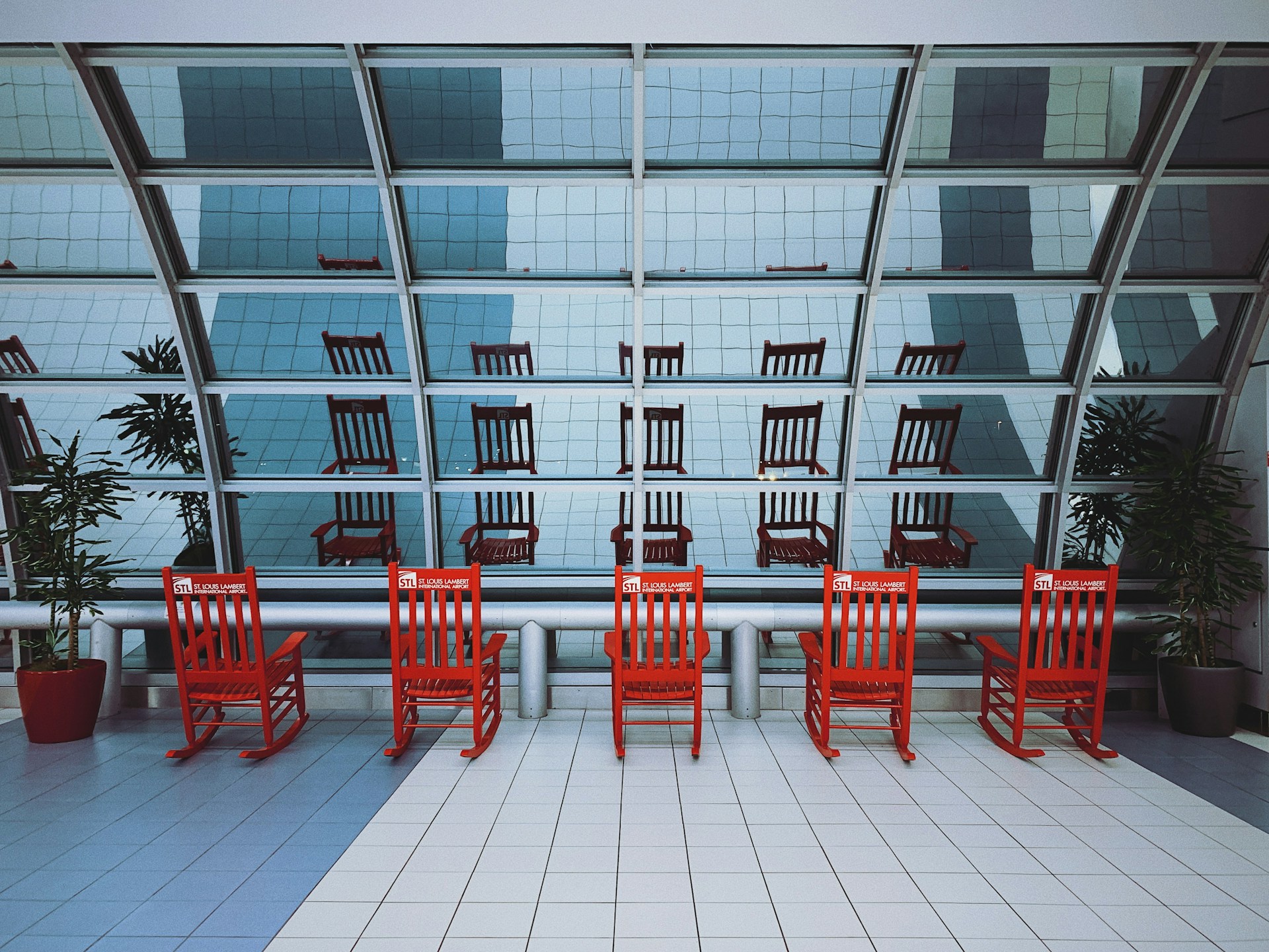 red chairs facing out from a walkway