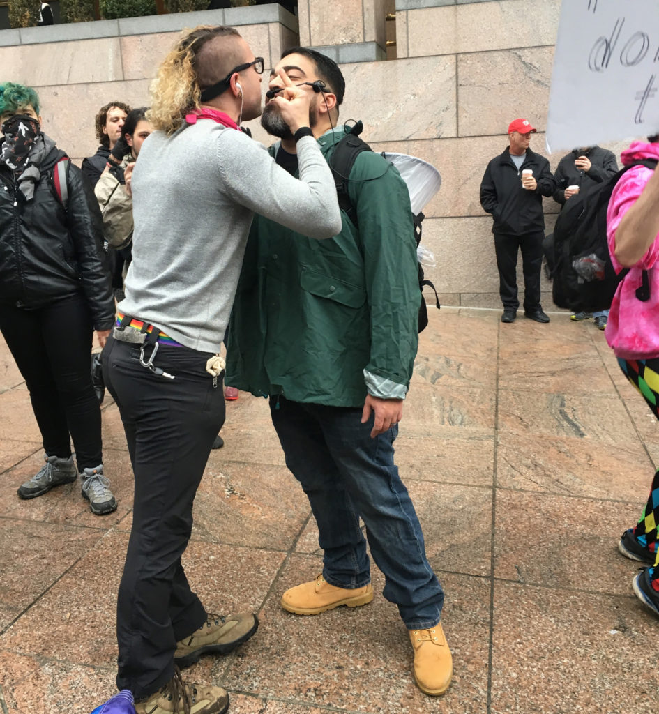 An anti abortion and an anti Trump protester clashed in downtown Washington. (Amanda McLaren/The Washington Post)