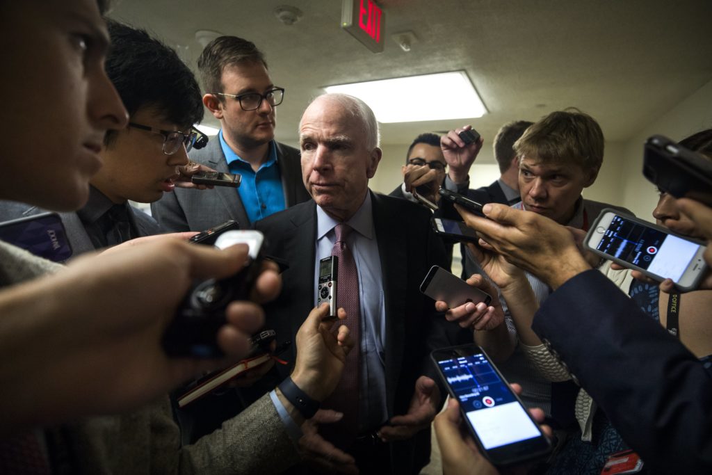 epa05970199 Republican Senator from Arizona John McCain speaks to the media about President Trump's disclosure of classified information to the Russians, along with reports that Trump asked CIA Director James Comey to close his investigation into Michael Flynn, at the Republican party headquarters in Washington, DC, USA, 17 May 2017. On 15 May the Washington Post reported that President Trump boastfully revealed highly-classified information to Russian diplomats in the Oval Office the week before. EPA/JIM LO SCALZO
