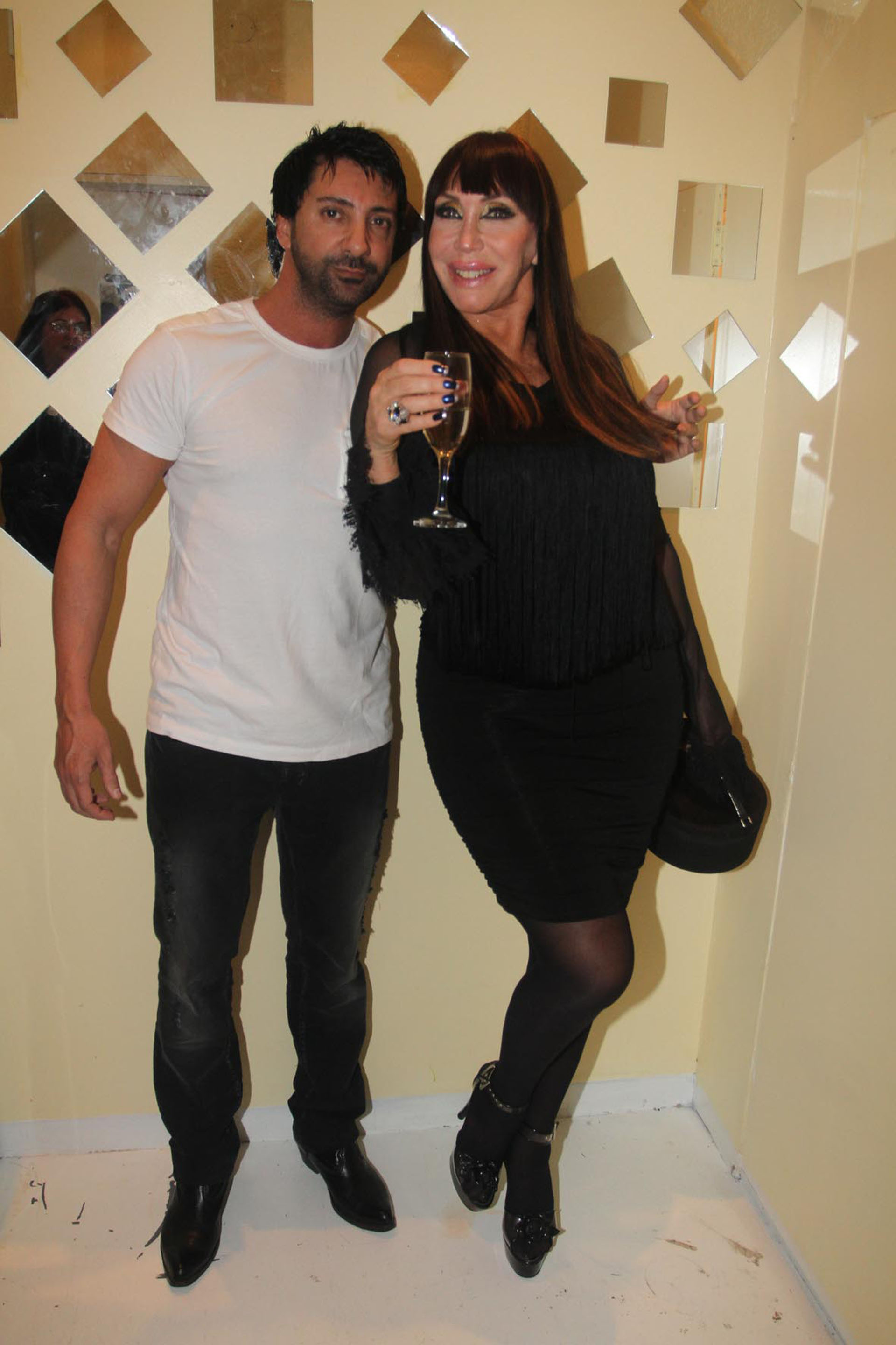 Moria con Luciano Garbellano en la inauguración de su parrilla