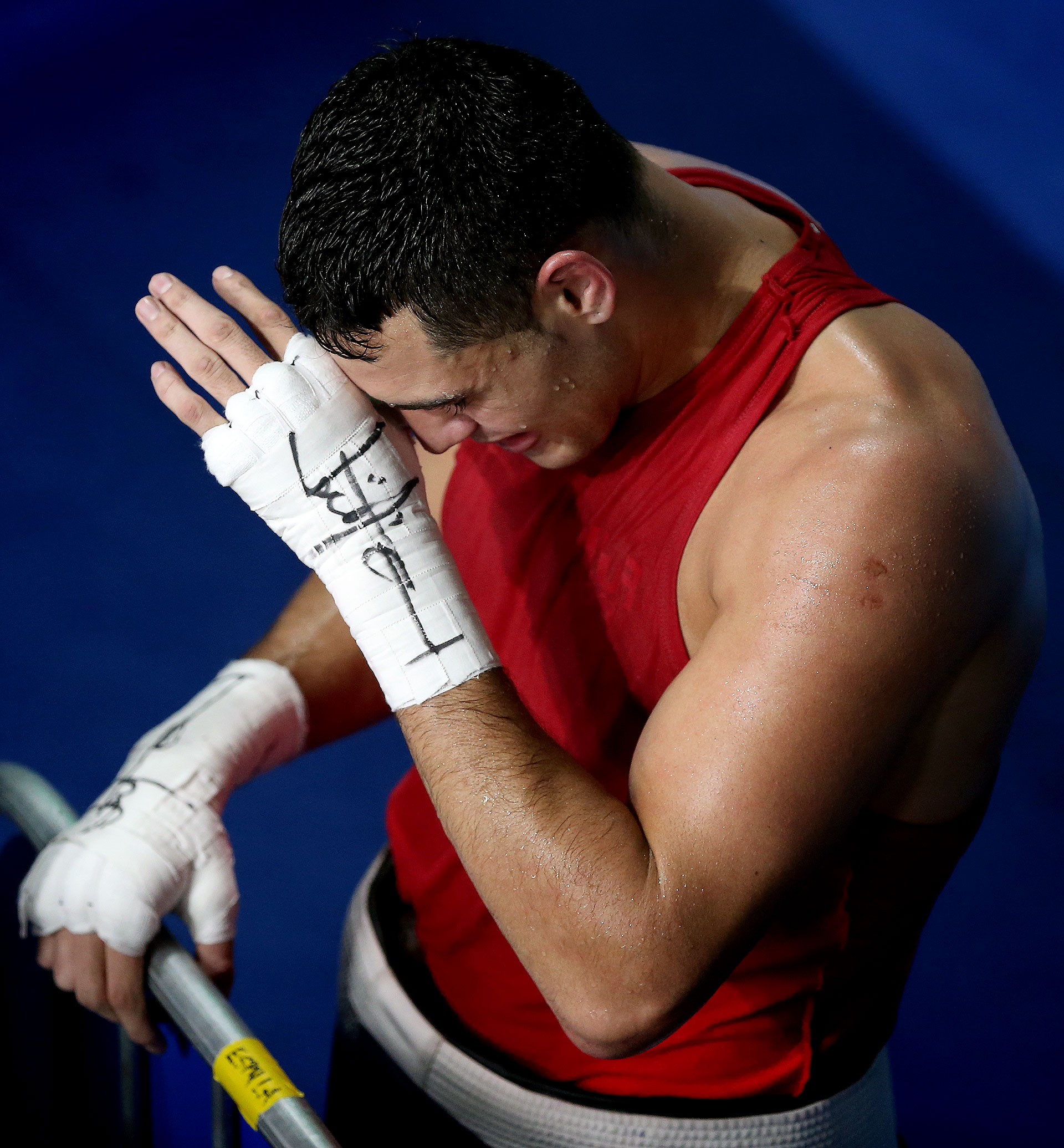 Yamil Peralta y toda su tristeza al quedar eliminado en cuartos de final ante el cubano Erislandy Savon (Nicolás Stulberg)