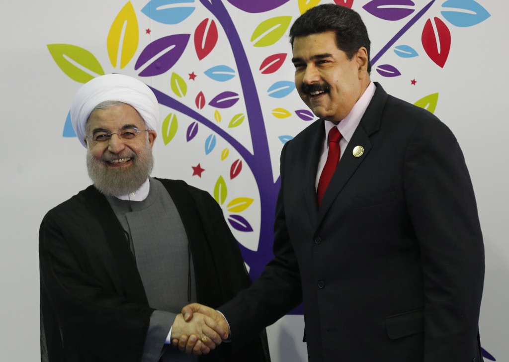 El presidente de Irán Hassan Rohani y el presidente venezolanon Nicolas Maduro, durante la inauguración de la cumbre de los Países No Alineados (AP)
