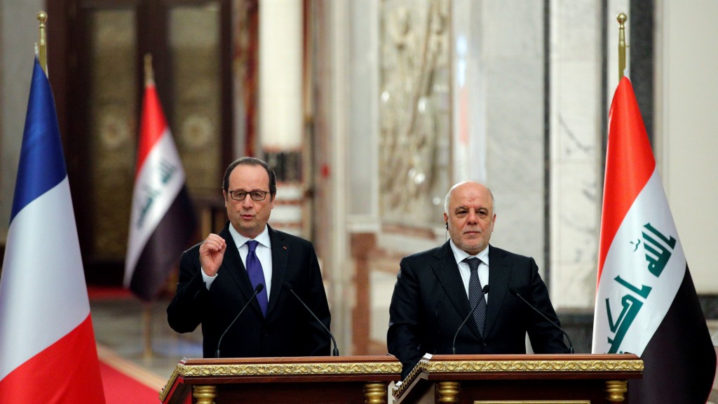 Hollande junto al primer ministro iraquí, Haider al-Abadi (AFP)