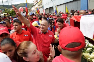 Diosdado Cabello, deputy of Venezuela's United Socialist Party (PSUV), walks next to the hearse carrying the coffin containing the remains of leftist guerrilla fighter Fabricio Ojeda, as he is brought to the National Pantheon, in Caracas, Venezuela January 23, 2017. REUTERS/Marco Bello