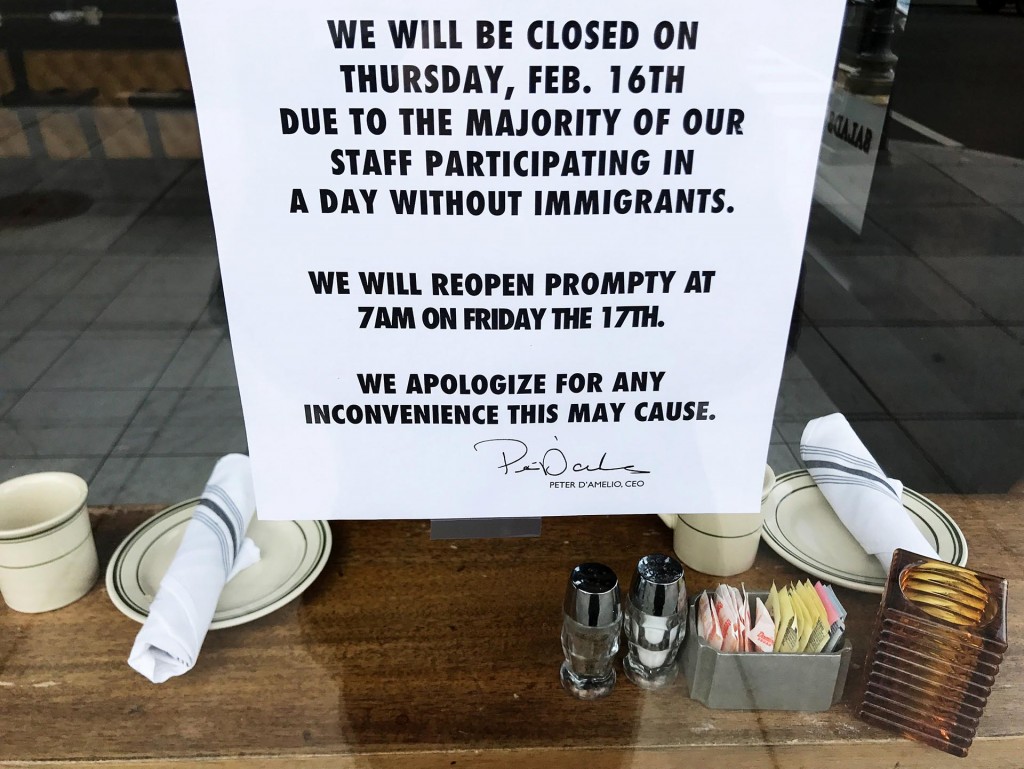 A sign in the window of Ted's Bulletin Restaurant on 14th St proclaims it closed in honor of the "Day Without Immigrants" protest in Washington, D.C., U.S. February 16, 2017. REUTERS/Jim Bourg