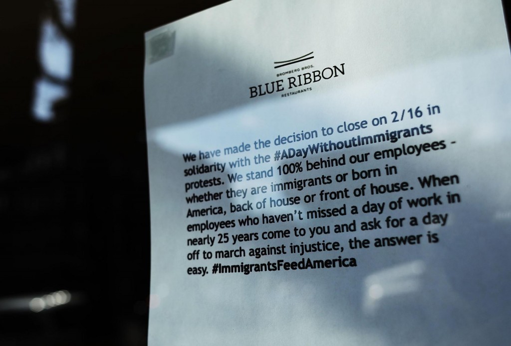 NEW YORK, NY - FEBRUARY 16: A sign in the window of the popular Brooklyn restaurant Blue Ribbon explains their solidarity with the "A Day Without Immigrants," boycott/strike on February 16, 2017 in New York, United States. Across the country hundreds of restaurants and eateries are closing for the day to protest President Trump's immigration agenda and to highlight the contributions of immigrants to U.S. business and life. (Photo by Spencer Platt/Getty Images)