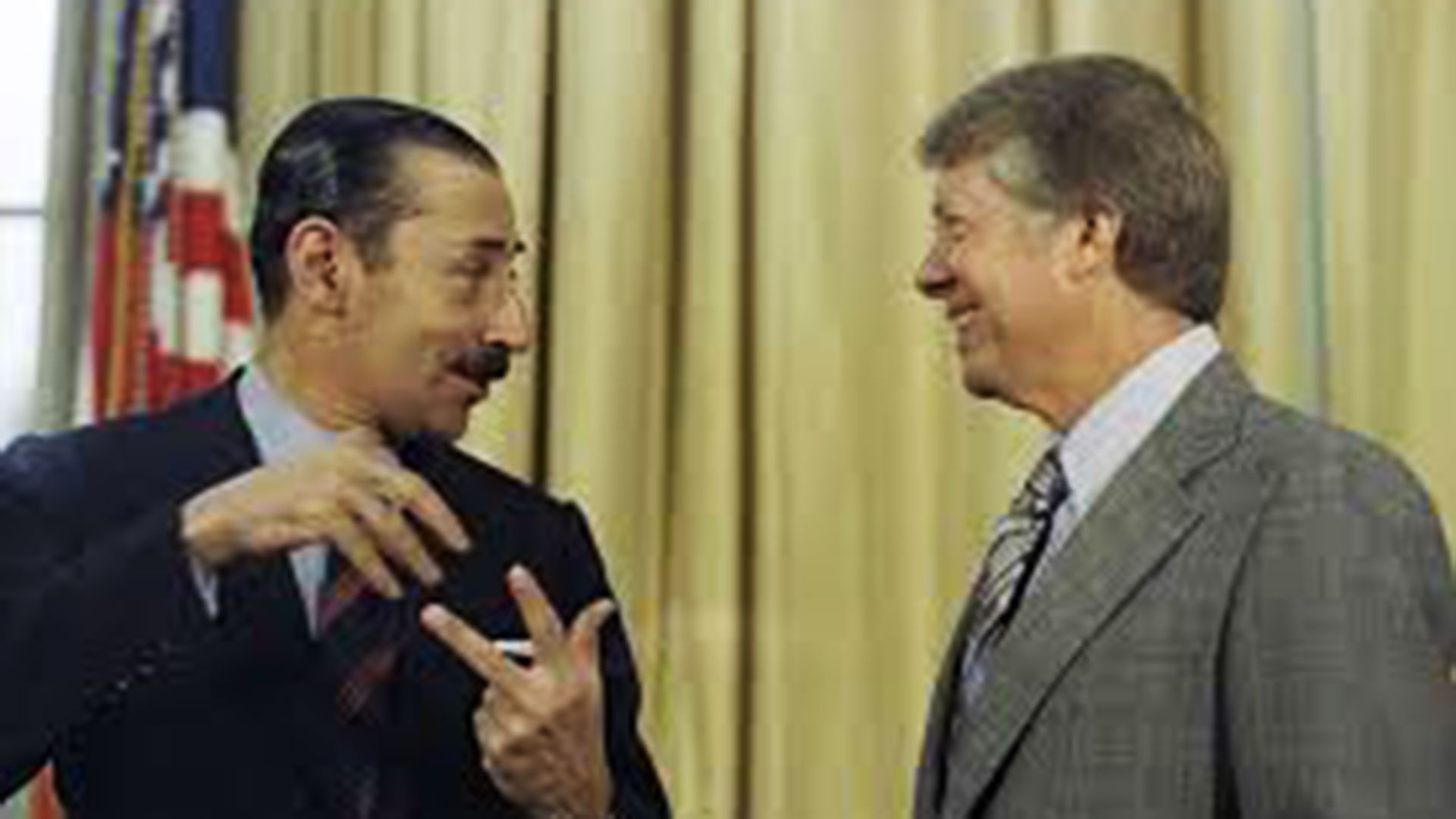 Jorge Rafael Videla junto a James Carter