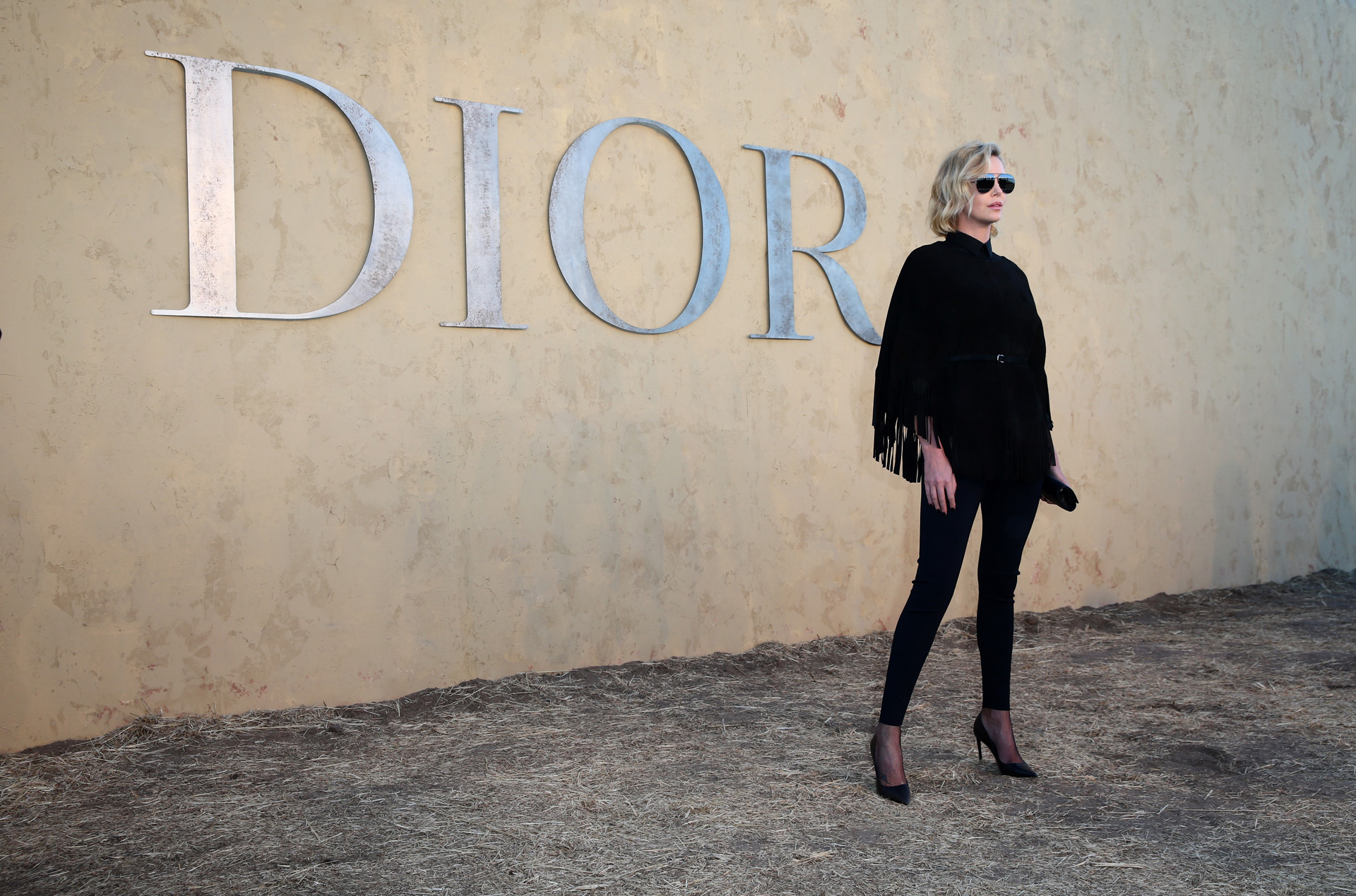 La actriz Charlize Theron, presente en el desfile Crucero 2018 (Photo by Rich Fury/Getty Images)
