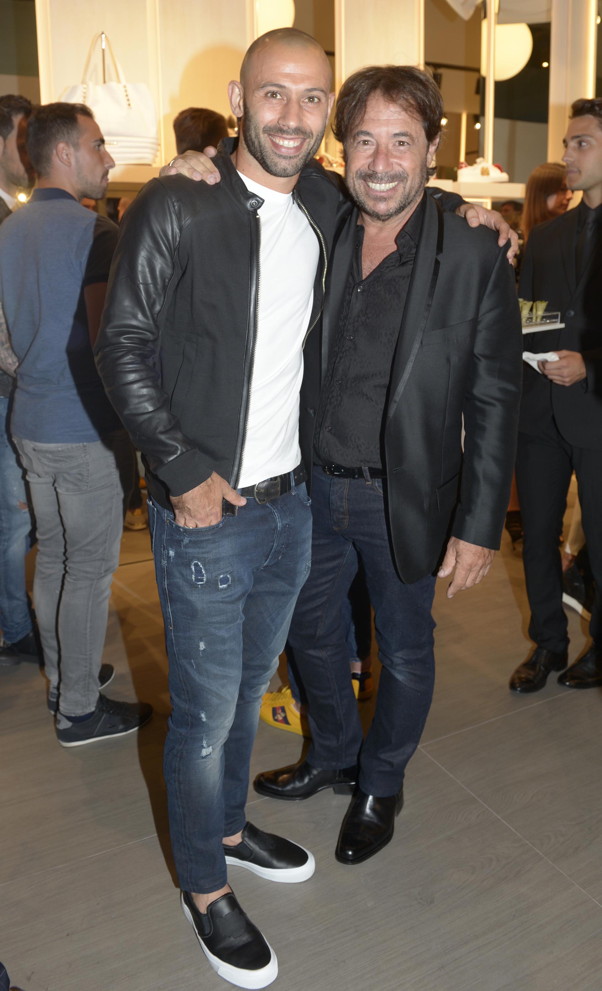 Javier Mascherano y Ricky Sarkany