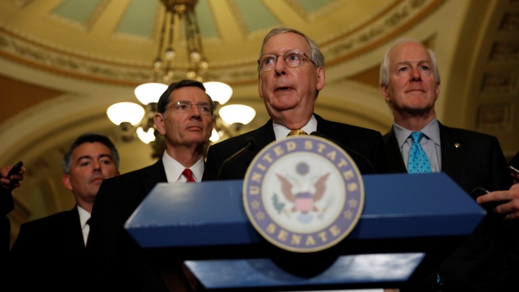 Senate Majority Leader Mitch McConnell, accompanied by Sen. Cory Gardner (R-CO), Sen. John Barrasso (R-WY) and Sen. John Cornyn (R-TX), speaks to the media following the weekly policy luncheons on Capitol Hill in Washington, D.C., U.S., June 6, 2017. REUTERS/Aaron P. Bernstein