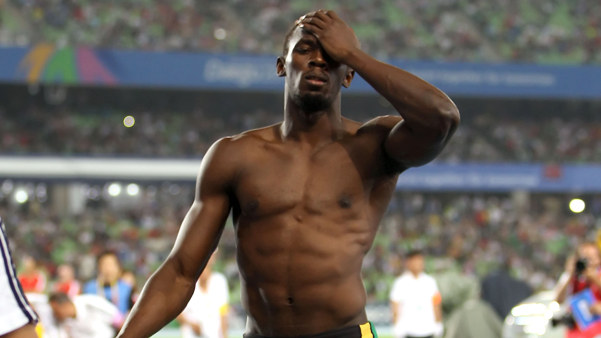 Usain Bolt fue descalificado por una salida en falso en la final de los 100 metros y mostró su decepción en el certamen disputado en Corea del Sur (Getty Images)