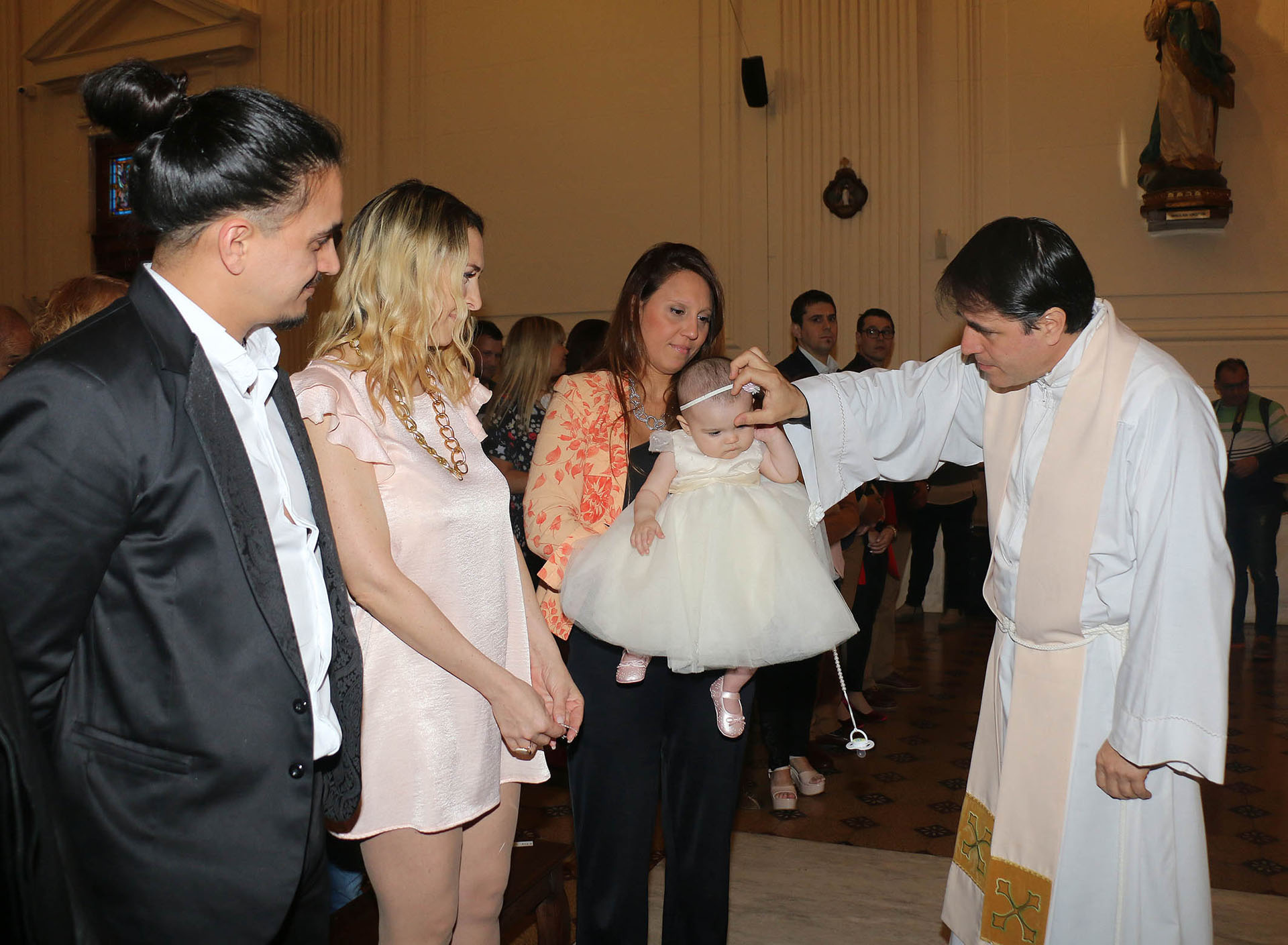 Lorena Liggi y su pareja Leandro D´Angelo, en el bautismo de su hija Indiana