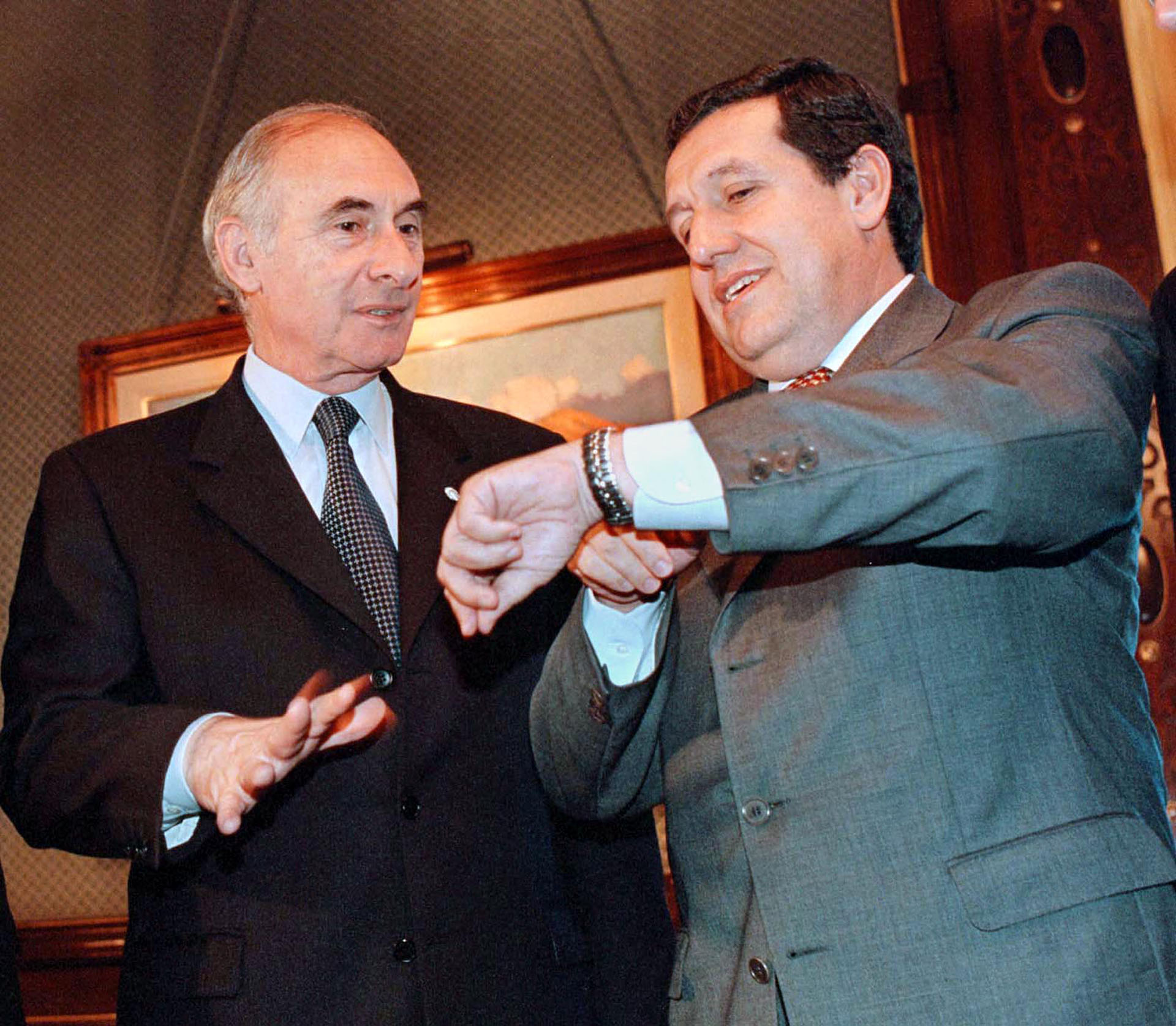 Fernando de la Rúa junto a Ramón Puerta en diciembre de 2001 (NA)