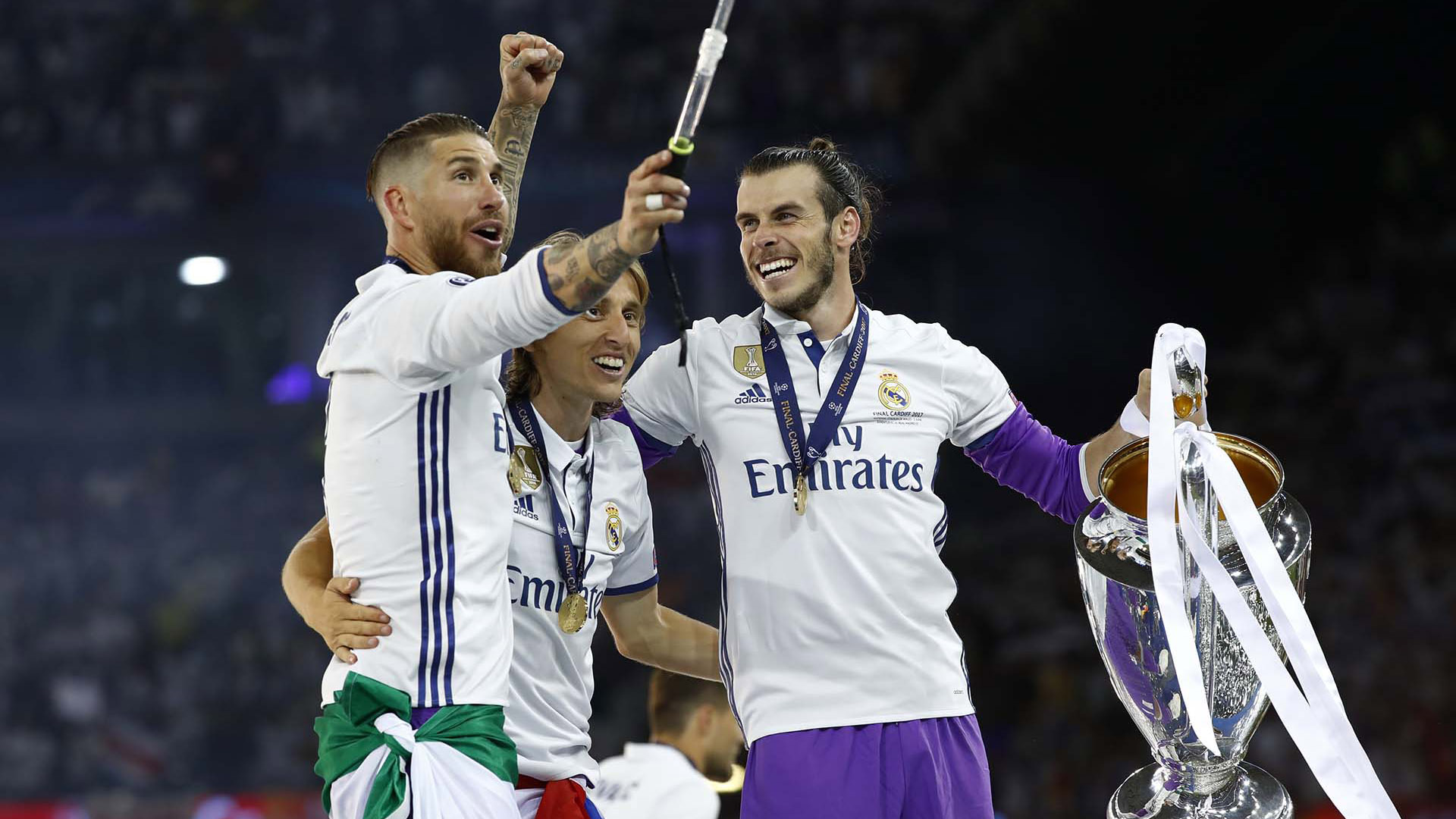 Luka Modric celebra la Champions League junto a Ramos y Bale (Reuters)