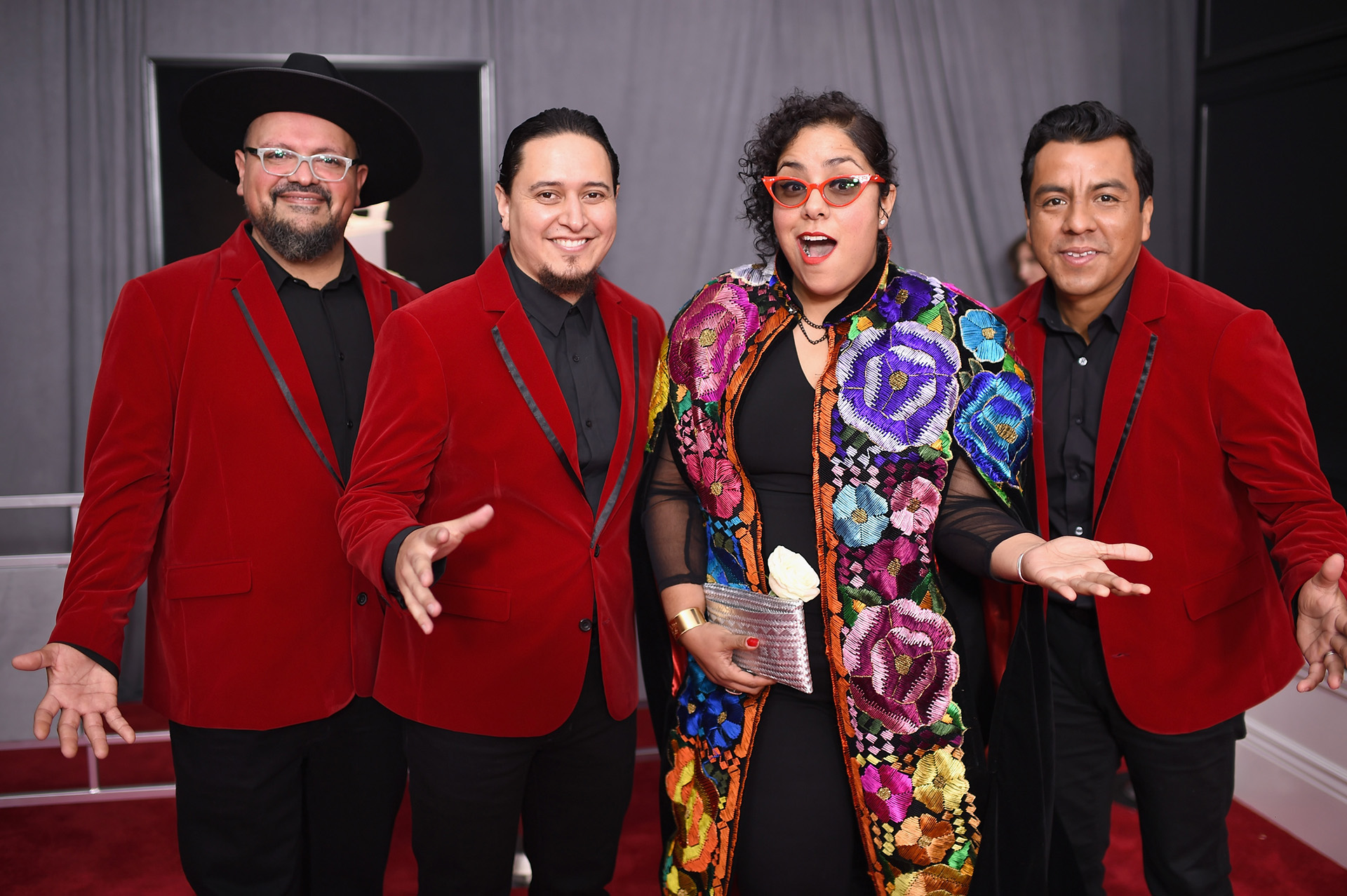 Alex Bendana, Jose Carlos, Gloria Estrada y Miguel Ramirez de la banda La Santa Cecilia (AFP)