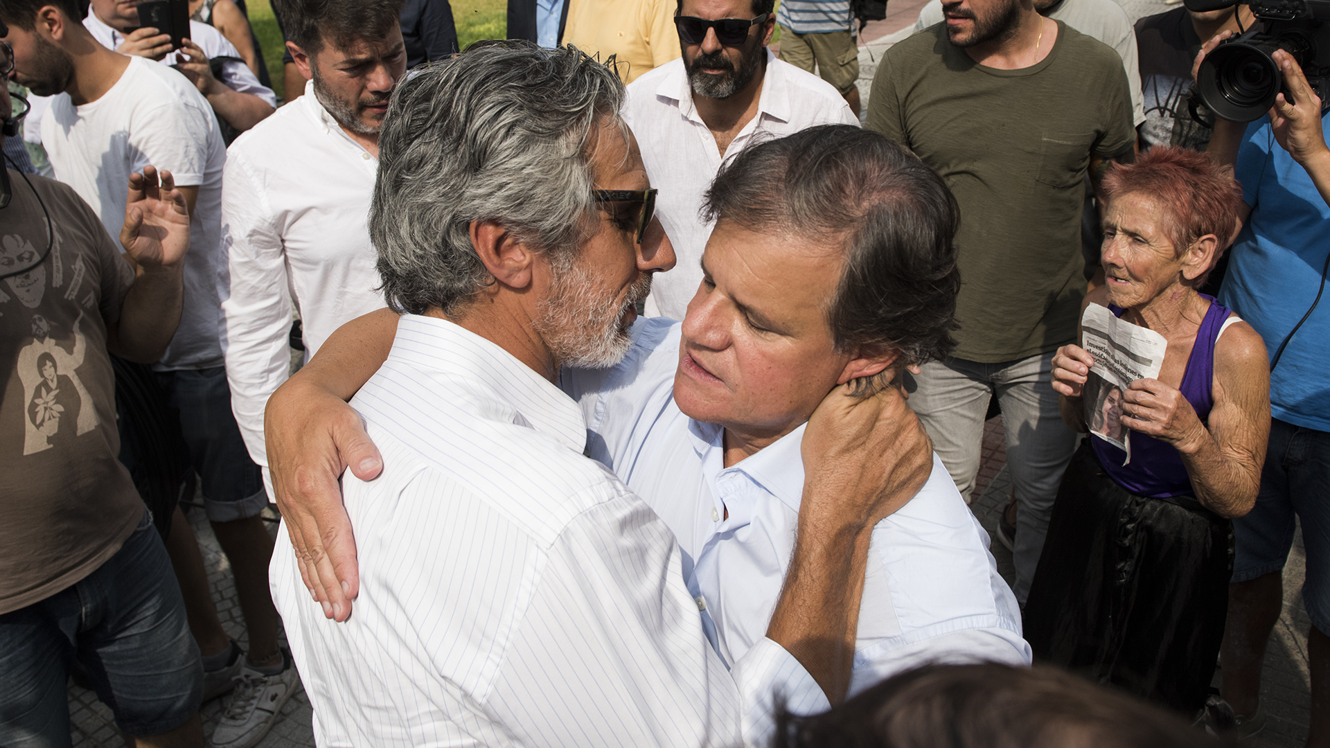 Juan Miceli saluda a Enrique Sacco