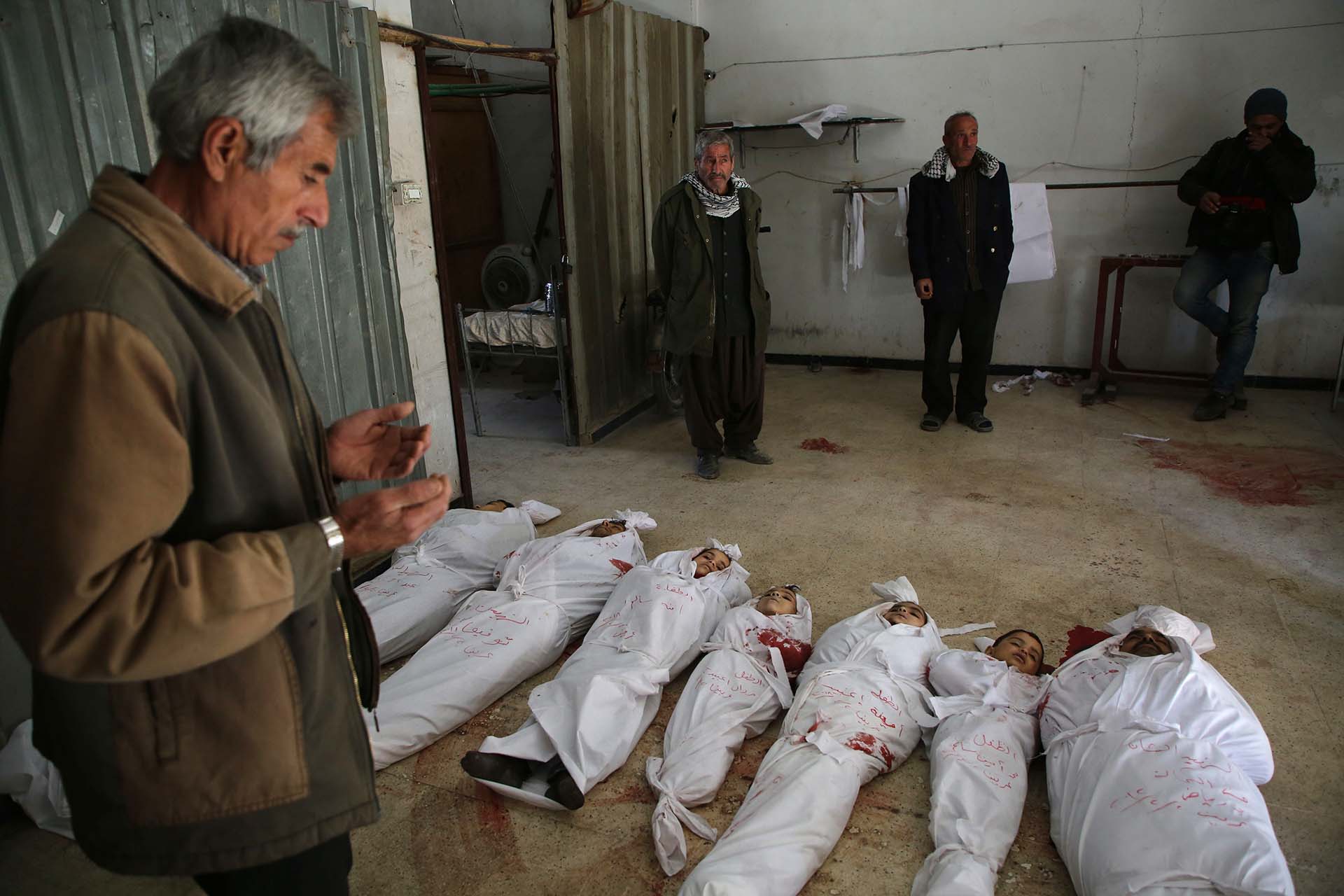 Decenas de niños fueron asesinados en los bombardeos (AFP)