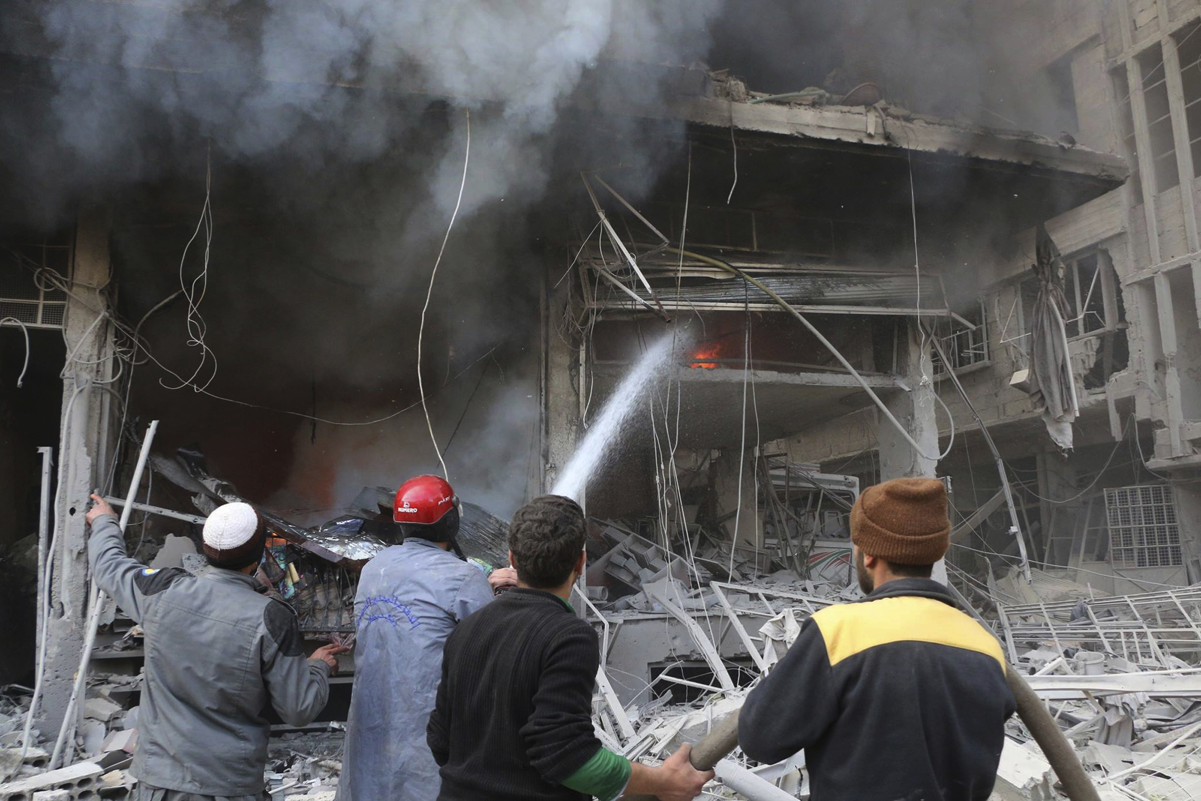 (Syrian Civil Defense White Helmets via AP)