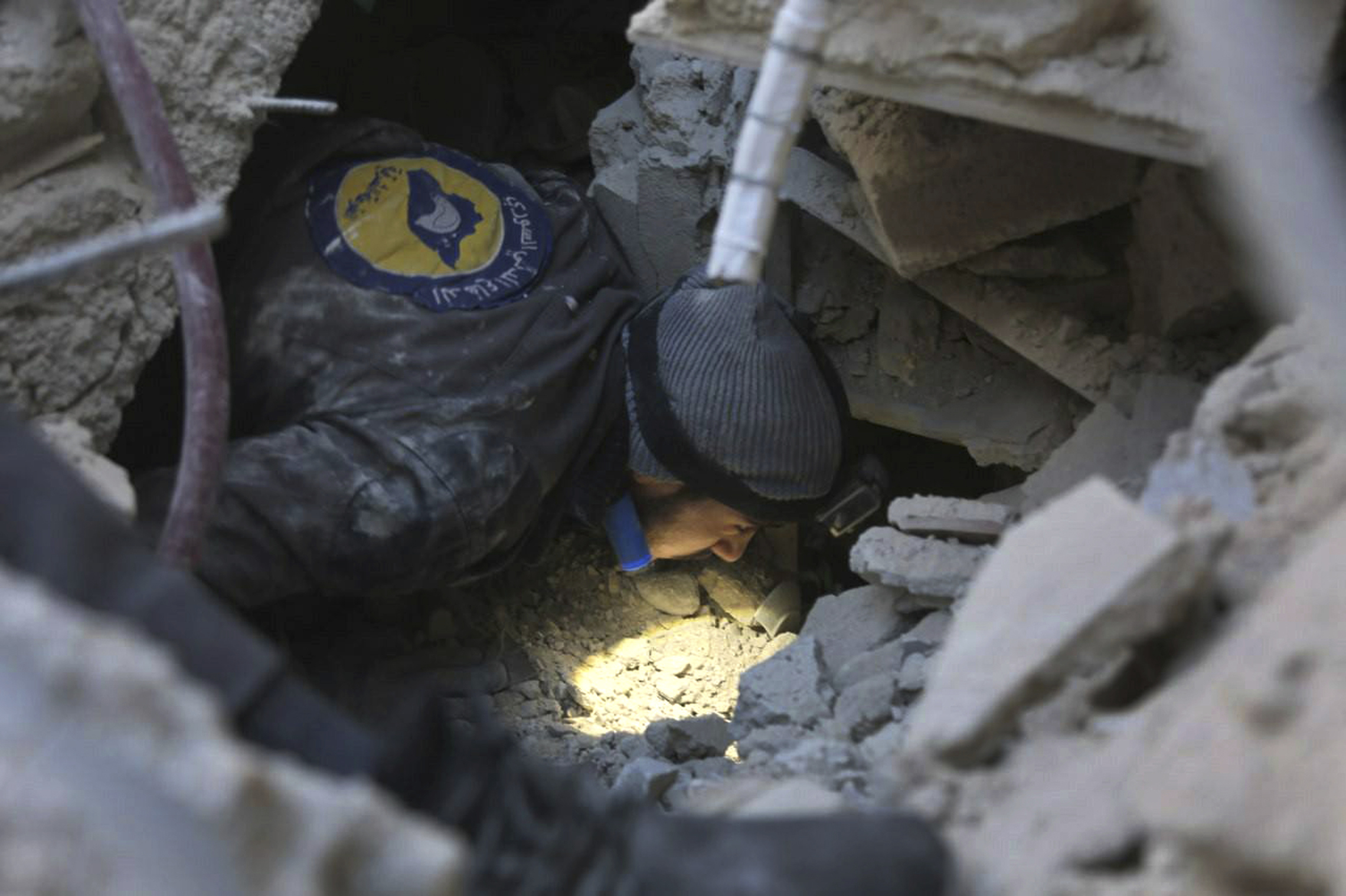 (Syrian Civil Defense White Helmets via AP)